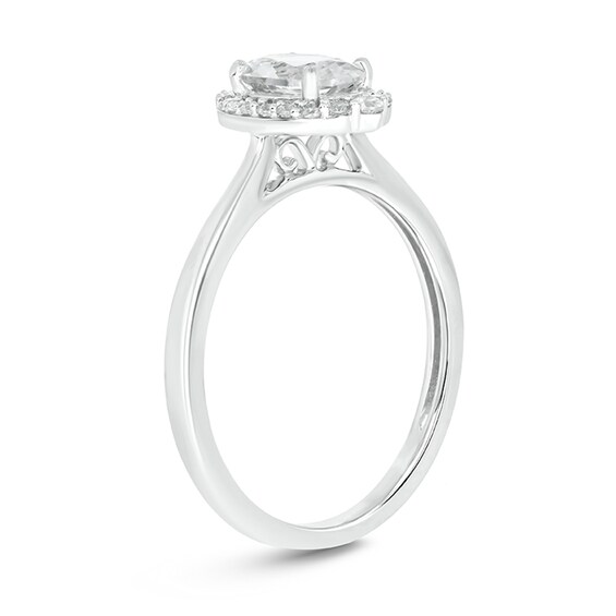 Oval White Lab-Created Sapphire and 1/6 CT. T.w. Diamond Frame Engagement Ring in 10K White Gold