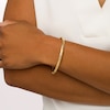 Thumbnail Image 1 of Oro Diamante™ 4.0mm Diamond-Cut Bangle in Hollow 14K Gold