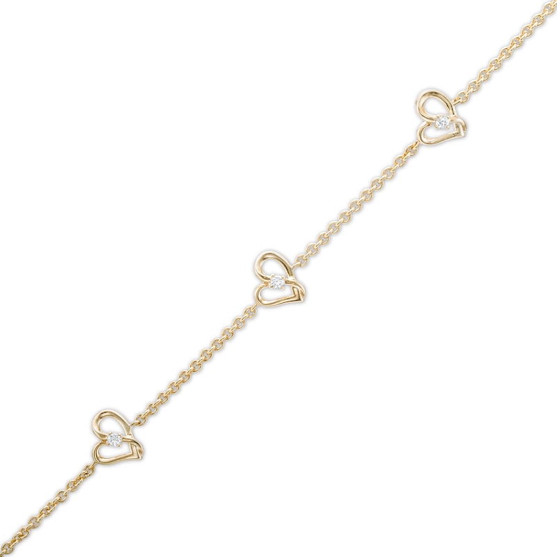 Main Image 1 of Two in Love 1/10 CT. T.W. Diamond Tilted Loop Heart Station Bracelet in 10K Gold – 7.5"