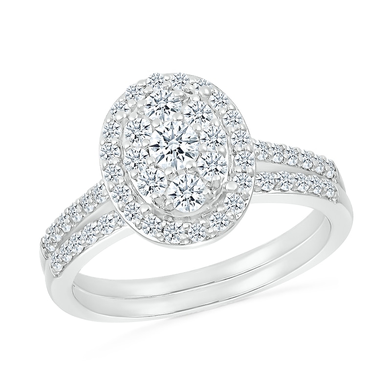 Main Image 1 of 1 CT. T.W. Oval-Shaped Multi-Diamond Frame Bridal Set in 10K White Gold