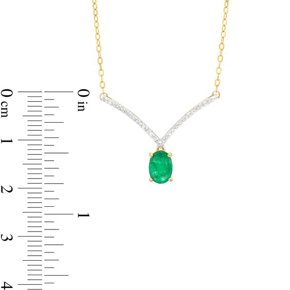 Oval Emerald and 1/15 CT. T.w. Diamond Chevron Necklace in 10K Gold â 17"