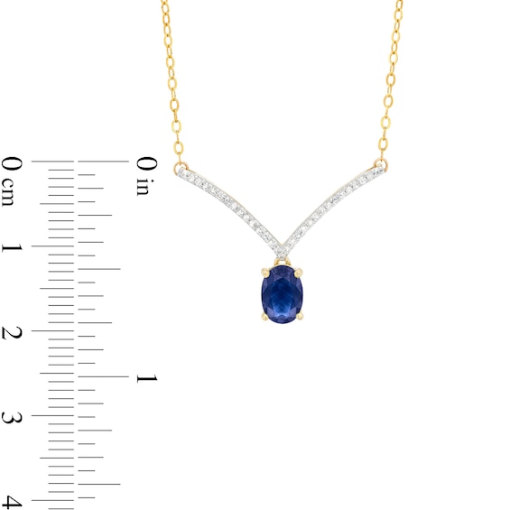 Oval Blue Sapphire and 1/15 CT. T.w. Diamond Chevron Necklace in 10K Gold – 17"