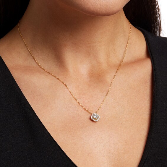1/5 CT. T.w. Cushion-Shaped Multi-Diamond Frame Tilted Pendant in 10K Gold