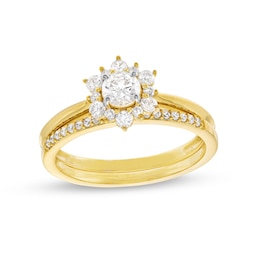 5/8 CT. T.W. Diamond Flower Frame Bridal Set in 10K Gold (J/I3)