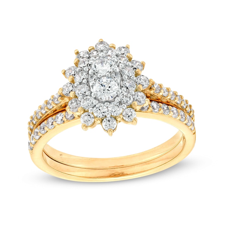 Main Image 1 of 1 CT. T.W. Oval-Shaped Multi-Diamond Double Flower Frame Bridal Set in 10K Gold (J/I3)