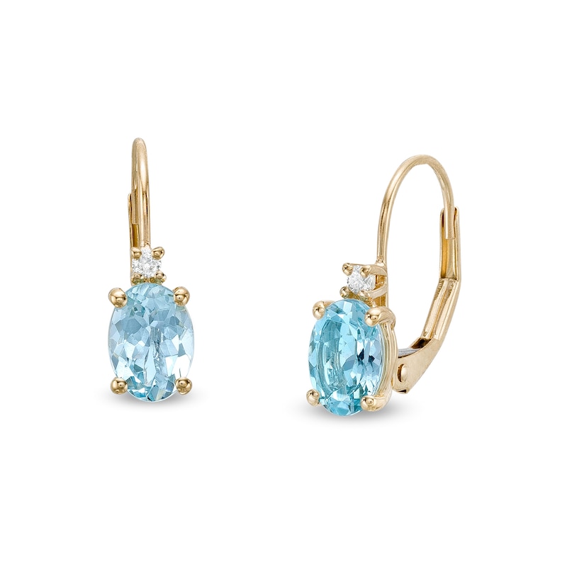 Main Image 1 of Oval Aquamarine and 1/20 CT. T.W. Diamond Drop Earrings in 10K Gold