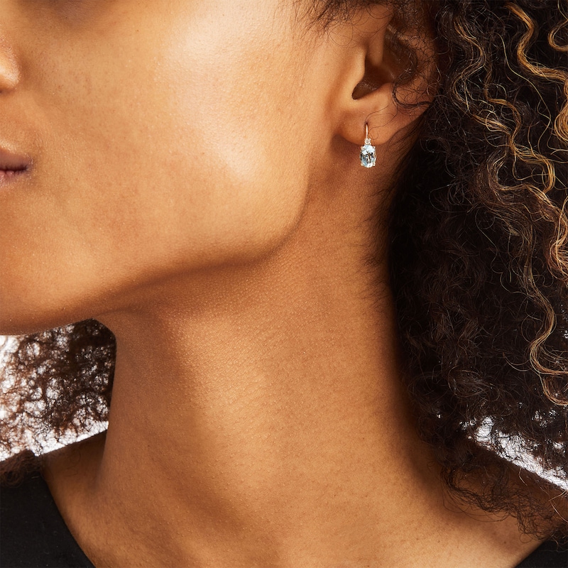 Main Image 2 of Oval Aquamarine and 1/20 CT. T.W. Diamond Drop Earrings in 10K Gold