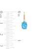 Thumbnail Image 2 of Oval Swiss Blue Topaz and 1/20 CT. T.W. Diamond Drop Earrings in 10K Gold