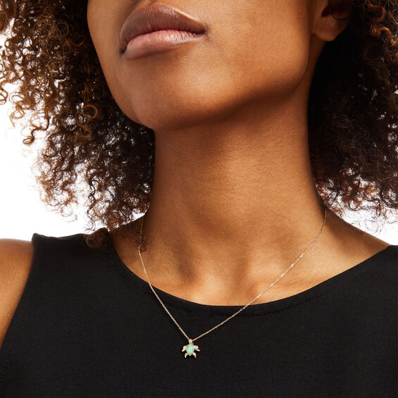Pear-Shaped Opal and 1/20 CT. T.w. Diamond Turtle Pendant in 10K Gold