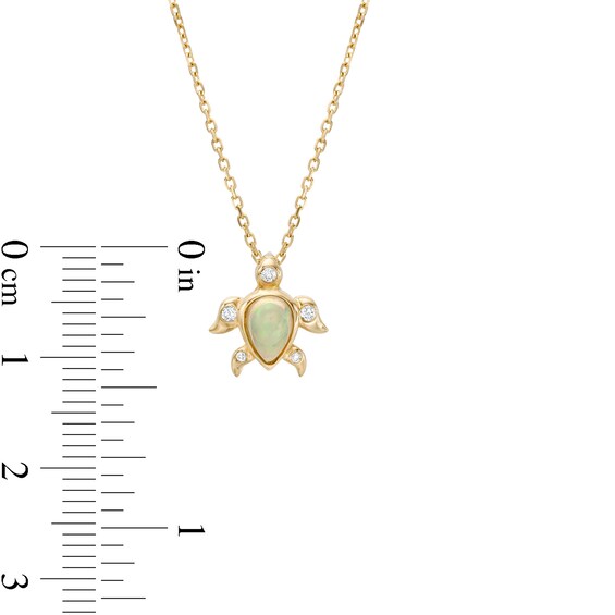 Pear-Shaped Opal and 1/20 CT. T.w. Diamond Turtle Pendant in 10K Gold