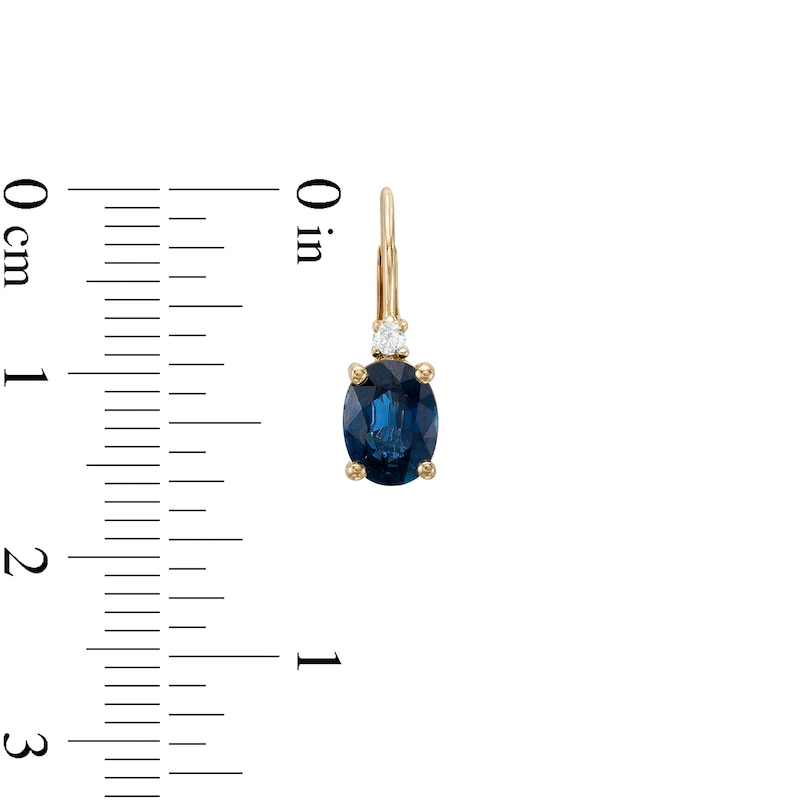 Main Image 3 of Oval Blue Sapphire and 1/20 CT. T.W. Diamond Drop Earrings in 10K Gold