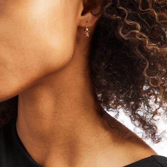 Oval Citrine and 1/20 CT. T.w. Diamond Drop Earrings in 10K Gold