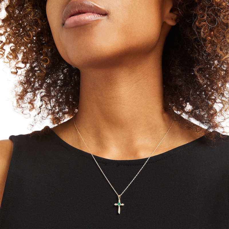 Main Image 2 of 3.0mm Emerald and 1/15 CT. T.W. Diamond Cross Pendant in 10K Gold