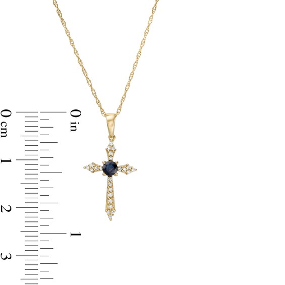 3.0mm Blue Sapphire and 1/15 CT. T.w. Diamond Cross Pendant in 10K Gold