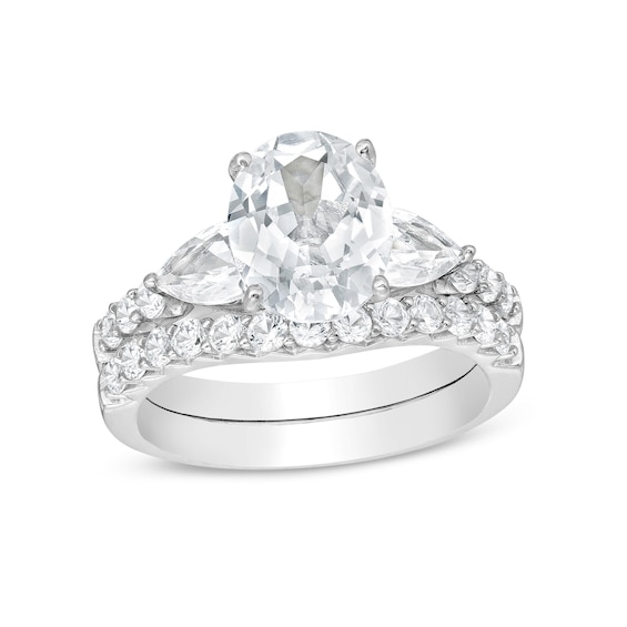 Oval White Lab-Created Sapphire Leaf-Sides Bridal Set in Sterling Silver