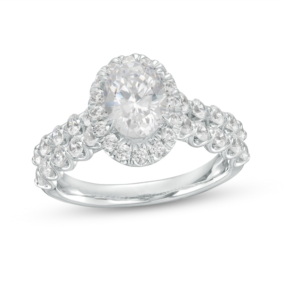 Celebration Ideal 2 CT. T.w. Oval Certified Diamond Frame Double Scallop Edge Shank Engagement Ring in 14K White Gold (I/I1)