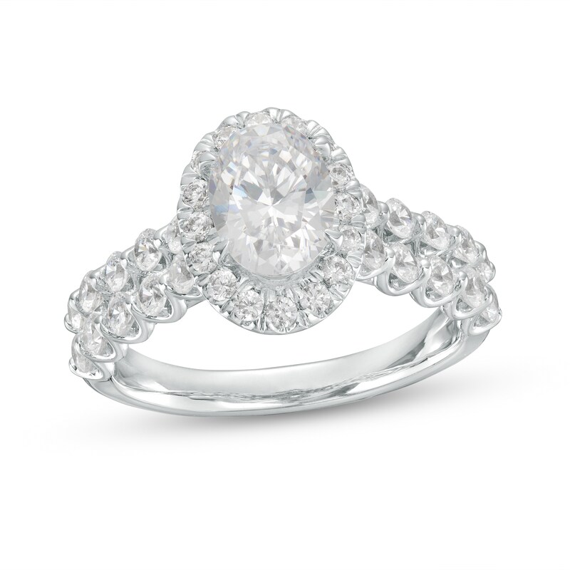 Main Image 1 of Celebration Ideal 2 CT. T.W. Oval Certified Diamond Frame Double Scallop Edge Shank Engagement Ring in 14K White Gold (I/I1)