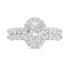 Thumbnail Image 4 of Celebration Ideal 2 CT. T.W. Oval Certified Diamond Frame Double Scallop Edge Shank Engagement Ring in 14K White Gold (I/I1)
