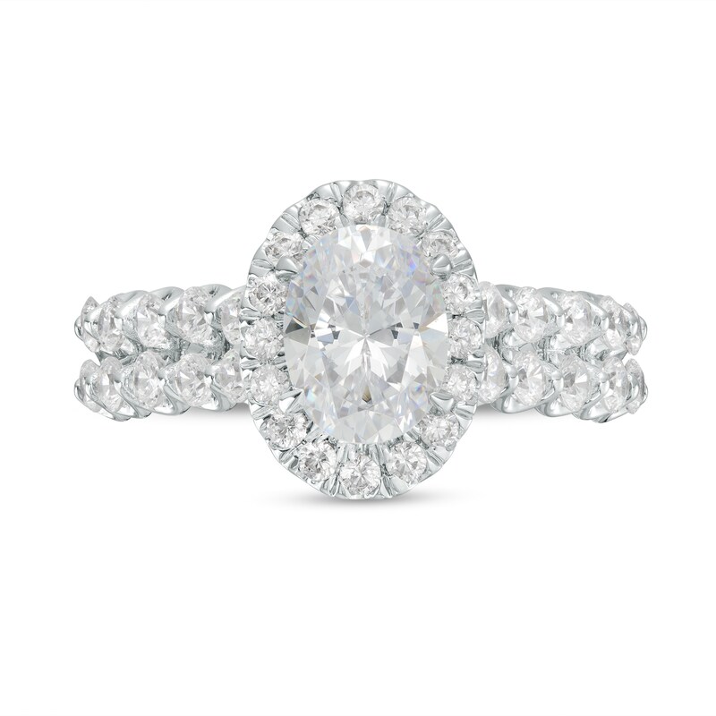 Main Image 4 of Celebration Ideal 2 CT. T.W. Oval Certified Diamond Frame Double Scallop Edge Shank Engagement Ring in 14K White Gold (I/I1)