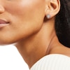 1/2 CT. T.W. Heart-Shaped Multi-Diamond Frame Stud Earrings in 10K White Gold