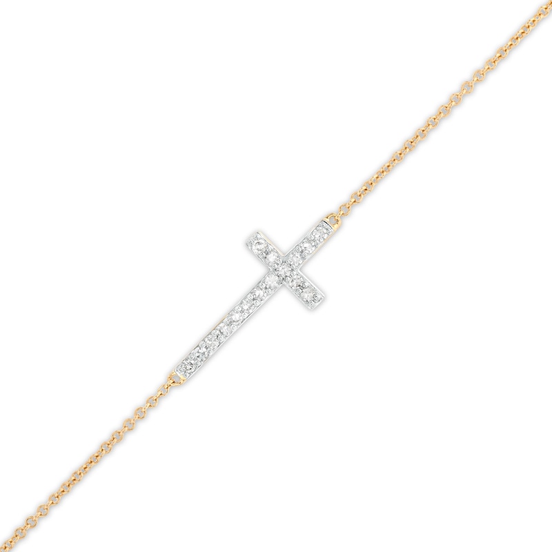 Main Image 1 of 1/6 CT. T.W. Diamond Sideways Cross Bracelet in 10K Gold – 7.5"