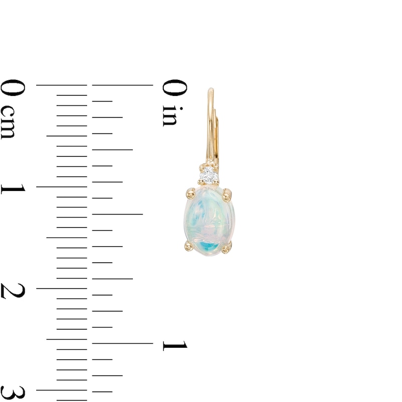 Oval Opal and 1/20 CT. T.W. Diamond Drop Earrings in 10K Gold