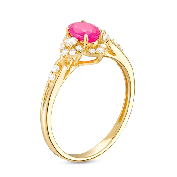 Oval Ruby and 1/4 CT. T.w. Diamond Frame Ring in 10K Gold