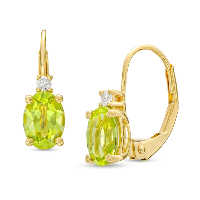 Main Image 1 of Oval Peridot and 1/20 CT. T.W. Diamond Stacked Drop Earrings in 10K Gold