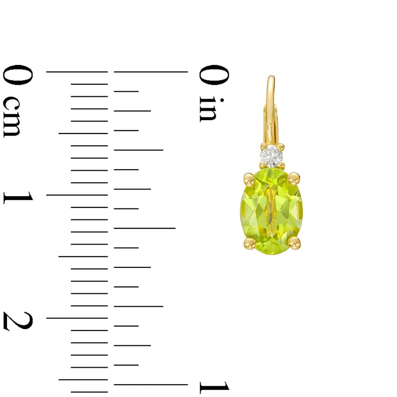 Main Image 3 of Oval Peridot and 1/20 CT. T.W. Diamond Stacked Drop Earrings in 10K Gold
