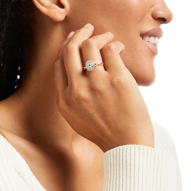 Main Image 2 of 1/2 CT. T.W. Oval-Shaped Multi-Diamond Frame Vintage-Style Twist Shank Ring in 10K Gold