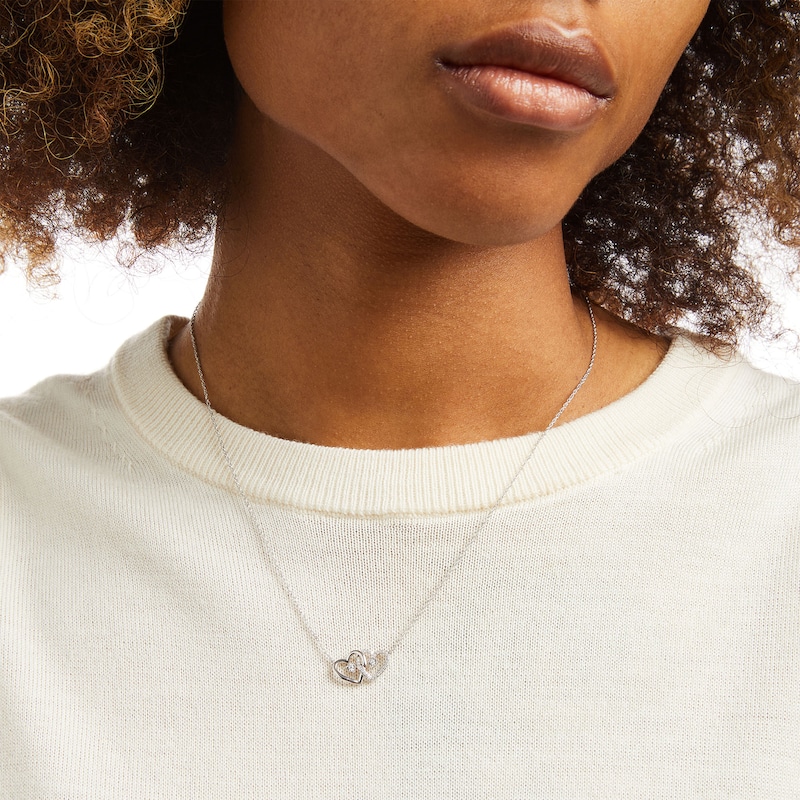 Main Image 2 of 1/15 CT. T.W. Diamond Interlocking Hearts Necklace in Sterling Silver