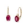 Thumbnail Image 1 of Oval Ruby and 1/20 CT. T.W. Diamond Drop Earrings in 10K Gold