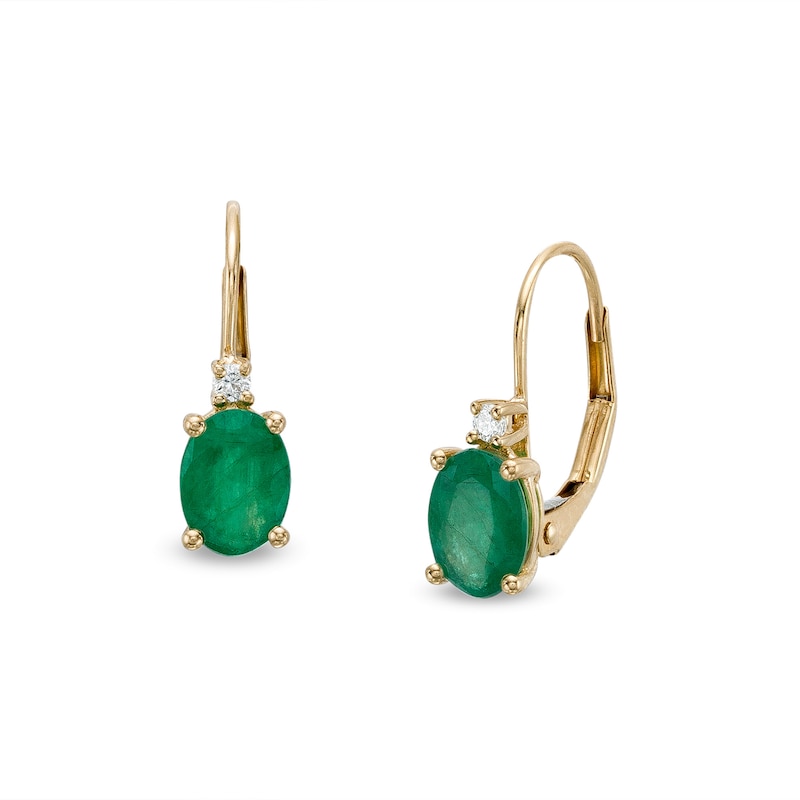 Main Image 1 of Oval Emerald and 1/20 CT. T.W. Diamond Drop Earrings in 10K Gold
