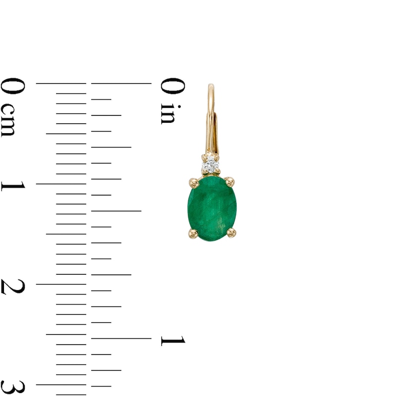 Main Image 3 of Oval Emerald and 1/20 CT. T.W. Diamond Drop Earrings in 10K Gold