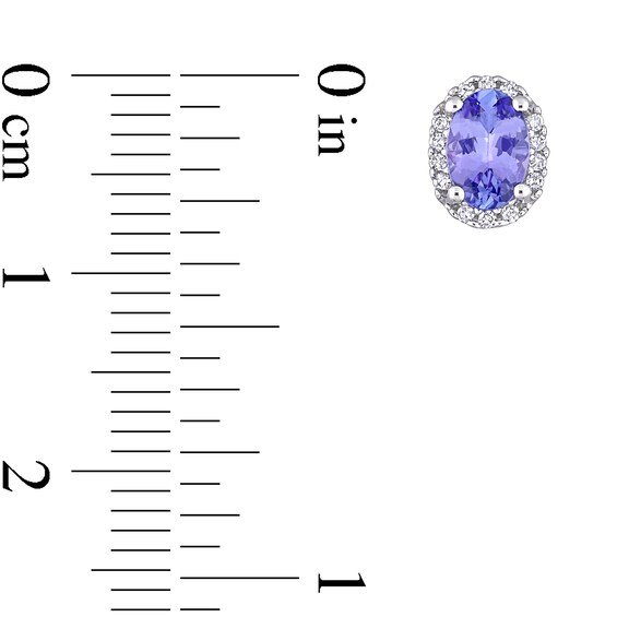 Oval Tanzanite and 1/15 CT. T.w. Diamond Frame Stud Earrings in 10K White Gold