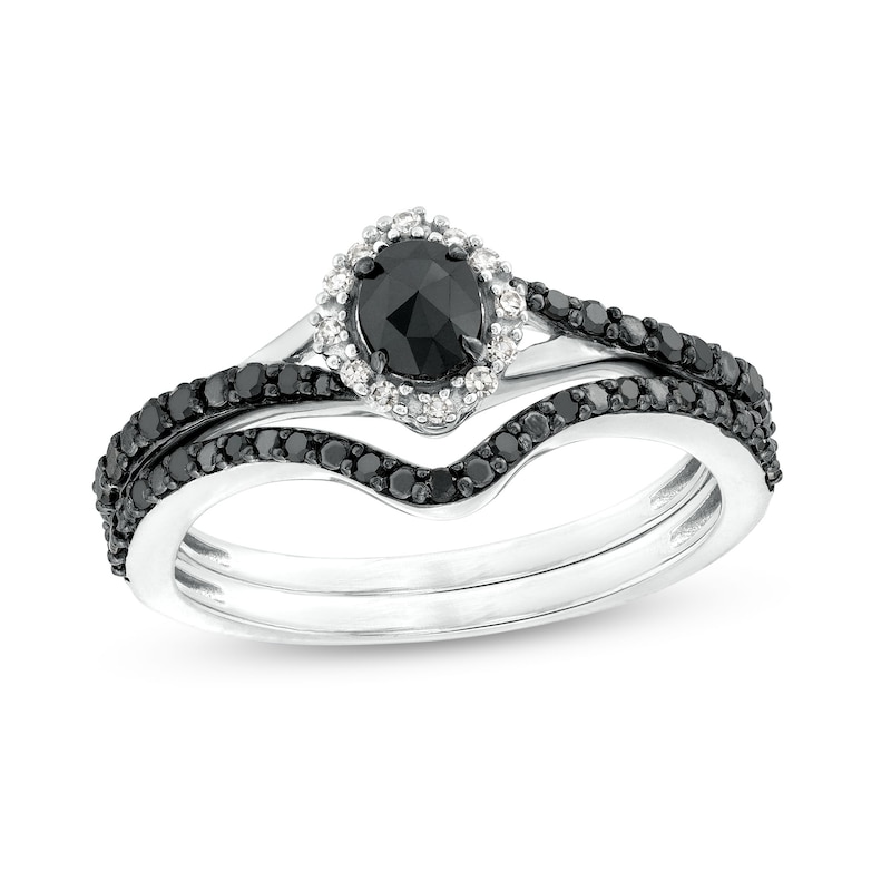 1/2 CT. T.W. Oval Black and White Diamond Frame Split Shank Bridal Set in 10K White Gold