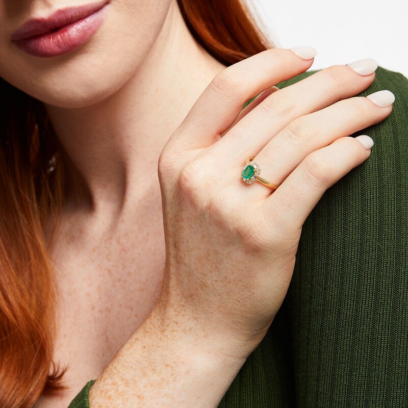 Main Image 2 of Emerald-Cut Emerald and 1/8 CT. T.W. Baguette and Round Diamond Frame Ring in 10K Gold