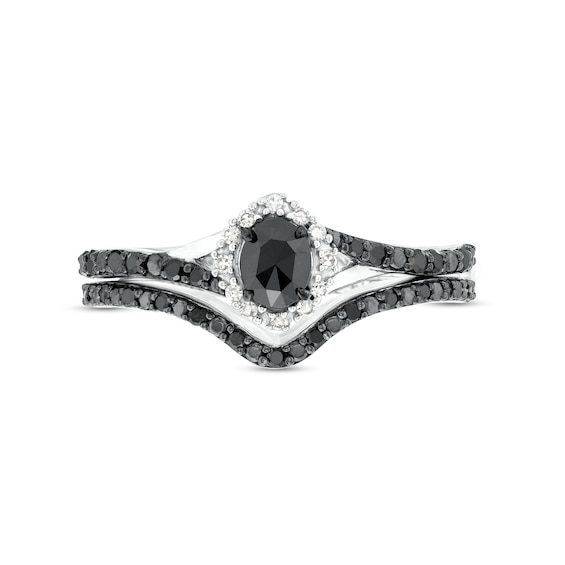 1/2 CT. T.w. Oval Black and White Diamond Frame Split Shank Bridal Set in 10K White Gold