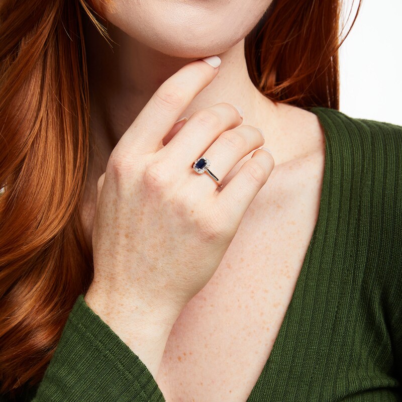 Main Image 2 of Emerald-Cut Blue Sapphire and 1/8 CT. T.W. Baguette and Round Diamond Frame Ring in 10K White Gold