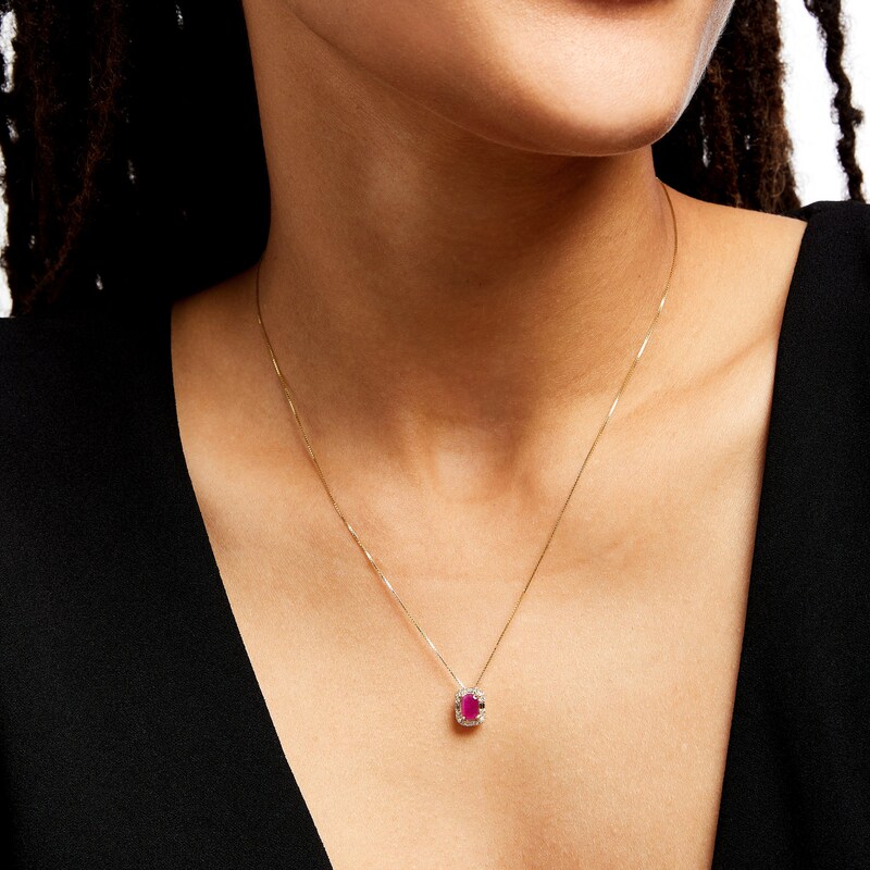 Main Image 2 of Emerald-Cut Ruby and 1/8 CT. T.W. Diamond Frame Pendant in 10K Gold