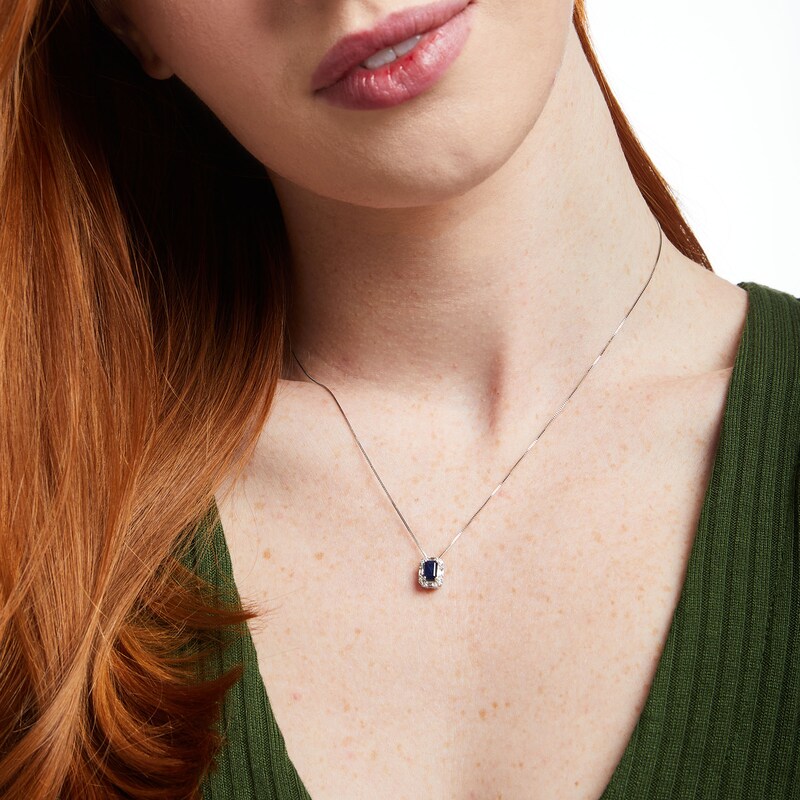 Main Image 2 of Emerald-Cut Blue Sapphire and 1/8 CT. T.W. Baguette and Round Diamond Frame Pendant in 10K White Gold