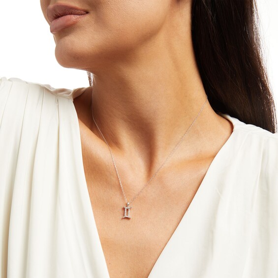 1/8 CT. T.w. Diamond Gemini Pendant in Sterling Silver
