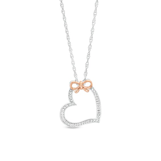1/20 CT. T.w. Diamond Beaded Bow Tied Tilted Heart Pendant in Sterling Silver and 10K Rose Gold