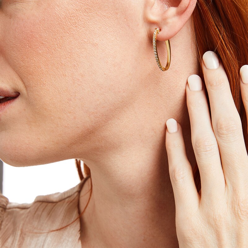 1/2 CT. T.W. Diamond Oval Hoop Earrings in 14K Gold