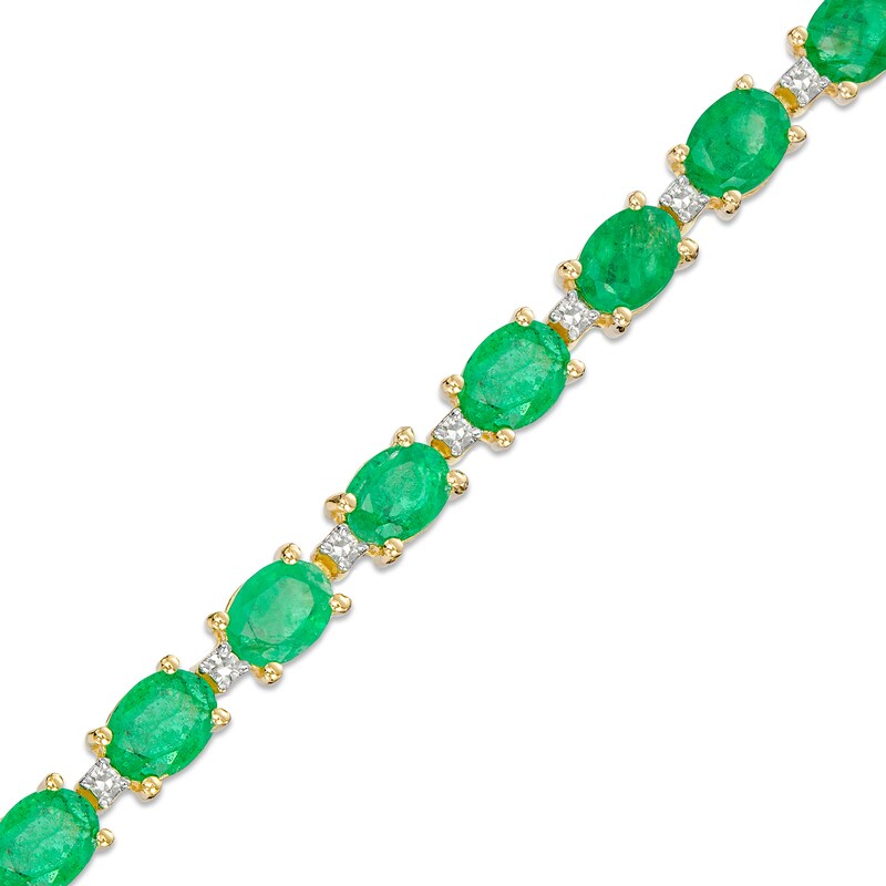 Main Image 1 of Oval Emerald and 1/6 CT. T.W. Diamond Alternating Line Bracelet in 10K Gold