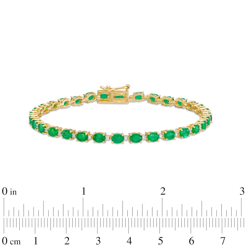 Main Image 4 of Oval Emerald and 1/6 CT. T.W. Diamond Alternating Line Bracelet in 10K Gold