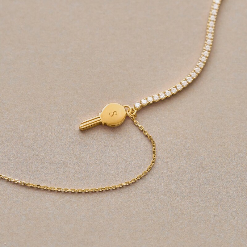 Main Image 7 of PDPAOLA™ at Zales Cubic Zirconia Dangle Key Bracelet in Sterling Silver with 18K Gold Plate – 7.28"