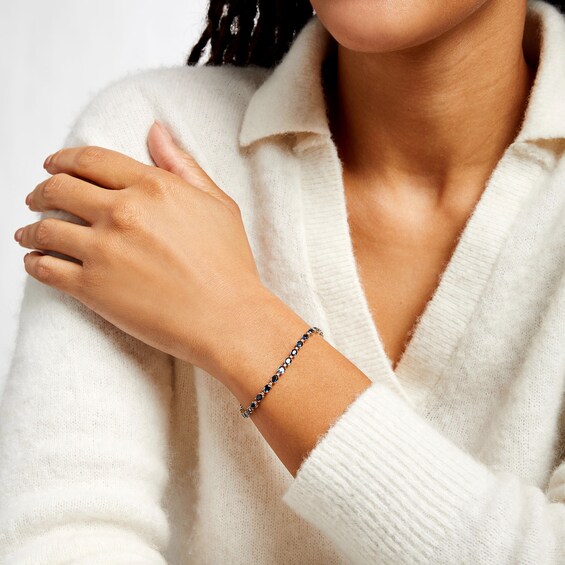Oval Blue Sapphire and 1/6 CT. T.w. Diamond Alternating Line Bracelet in 10K Gold