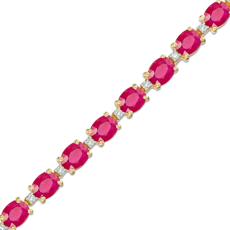 Main Image 1 of Oval Ruby and 1/6 CT. T.W. Diamond Alternating Line Bracelet in 10K Gold