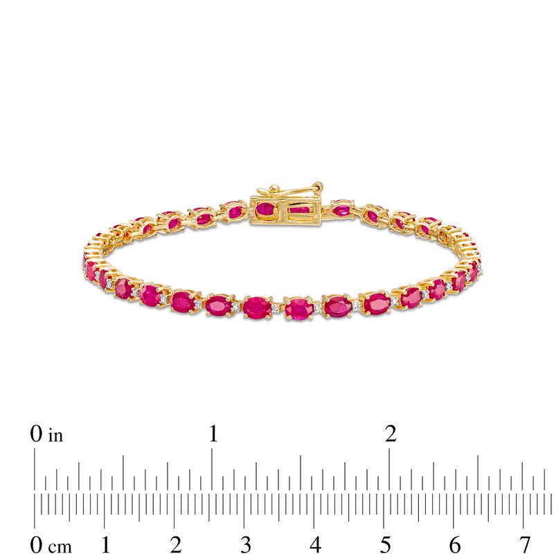 Main Image 4 of Oval Ruby and 1/6 CT. T.W. Diamond Alternating Line Bracelet in 10K Gold
